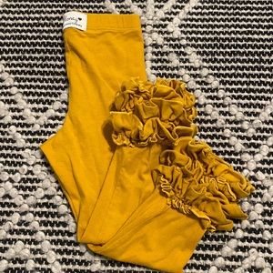 SweetHoney mustard colored girl’s ruffle bottom leggings, size 4 toddler
